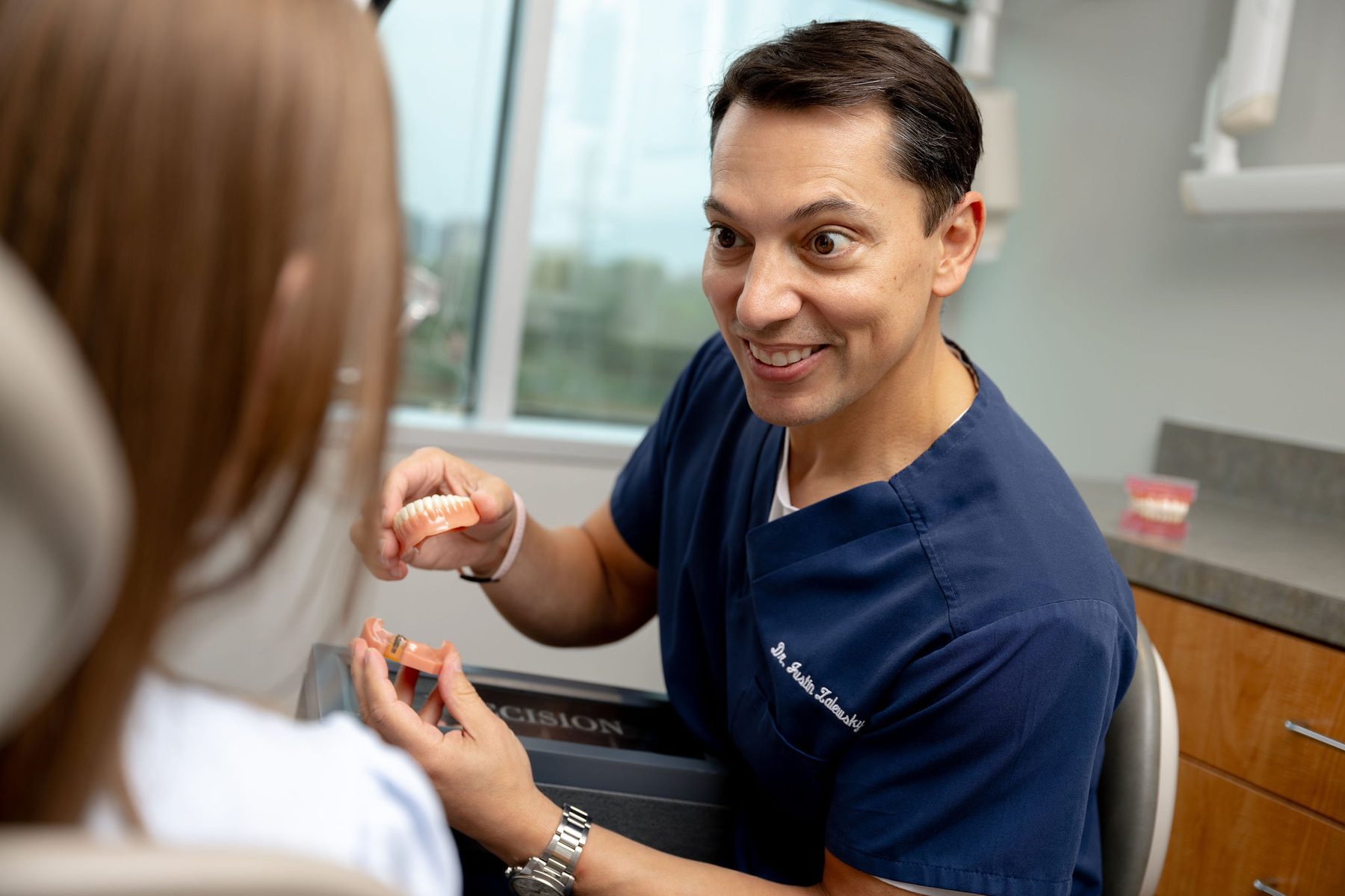 Dr. Zalewsky consulting with patient
